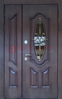 Темная металлическая дверь Винорит со стеклом и ковкой ДСК-239 в Куровском