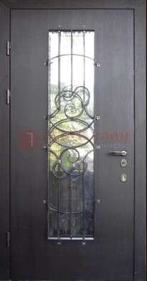Остекленная стальная дверь с ковкой ДСК-26 в Казани