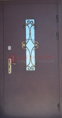 Металлическая дверь со стеклом и ковкой ДСК-77 в панельный дом в Орехово-Зуево
