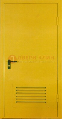 Желтая металлическая техническая дверь с вентиляционной решеткой ДТ-15 в Чехове