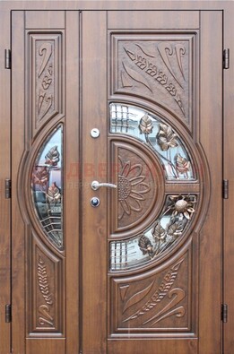 Уличная дверь в цвете Итальянский орех с виноритом и ковкой со стеклом ДВТ-147 в Куровском